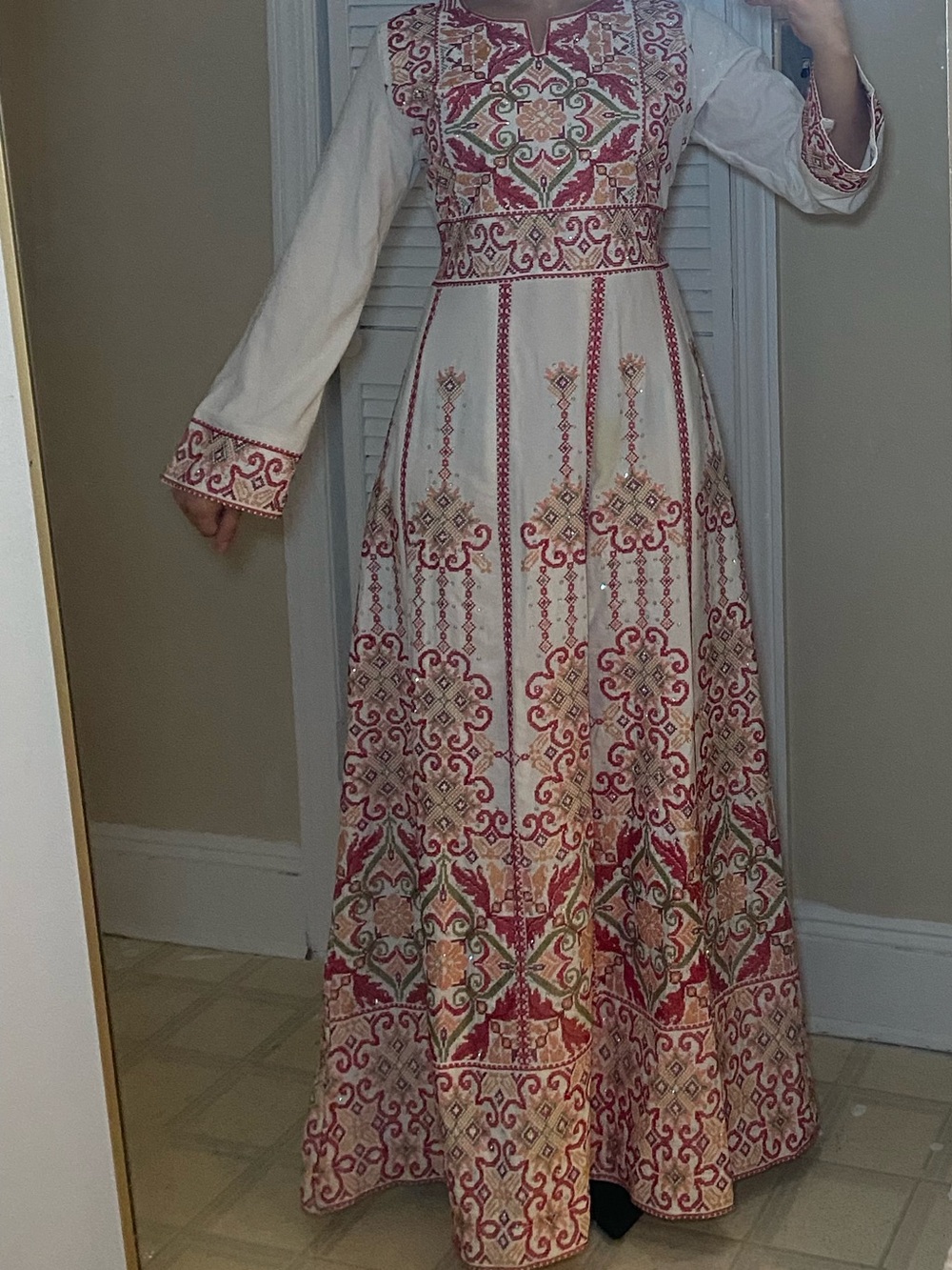 Embroidered Palestinian Thobe with Red Floral Accents